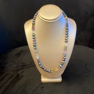 Brand new multi-colored beaded necklace; 16 inches around